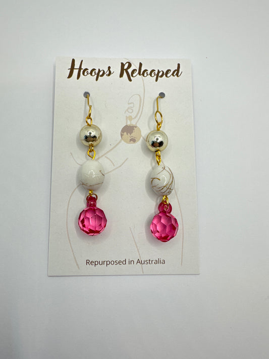 Silver, white and pink balls
