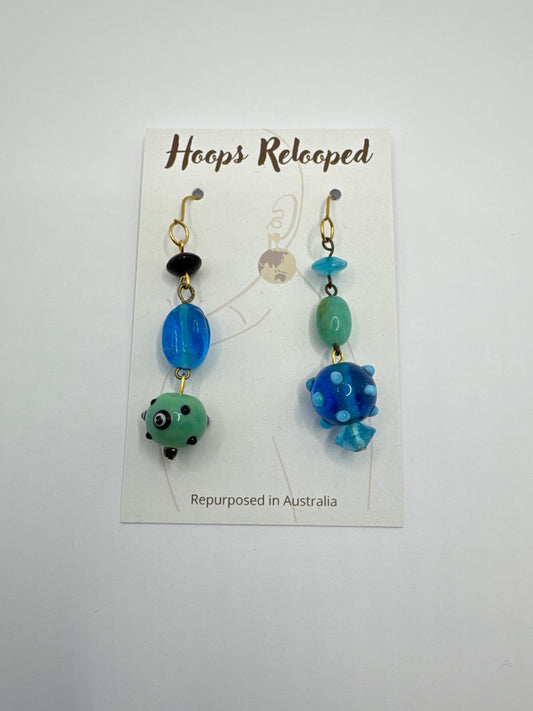 Blue and green spiky balls