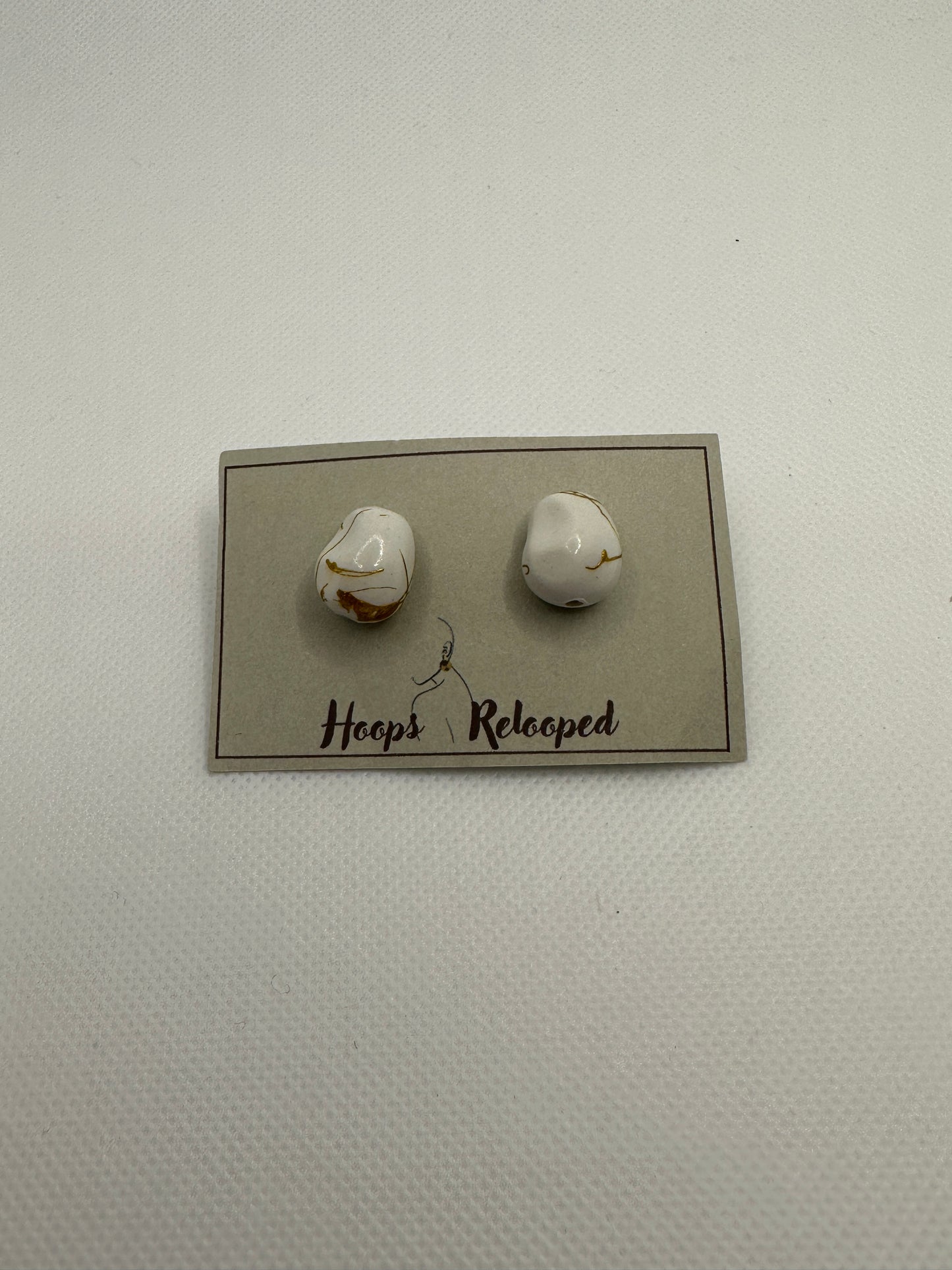 White and gold bead studs