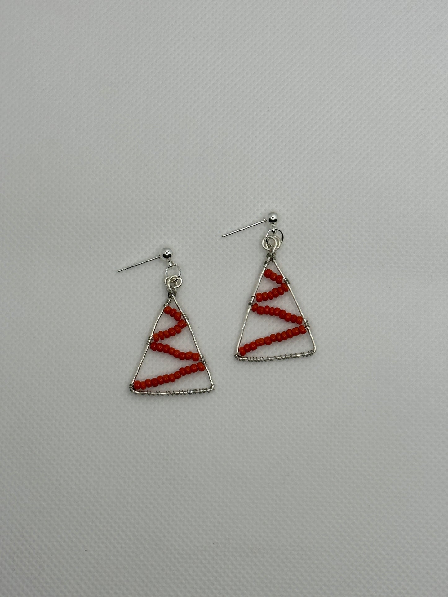 Christmas silver trees with red tinsel