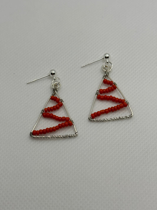 Christmas silver trees with red tinsel