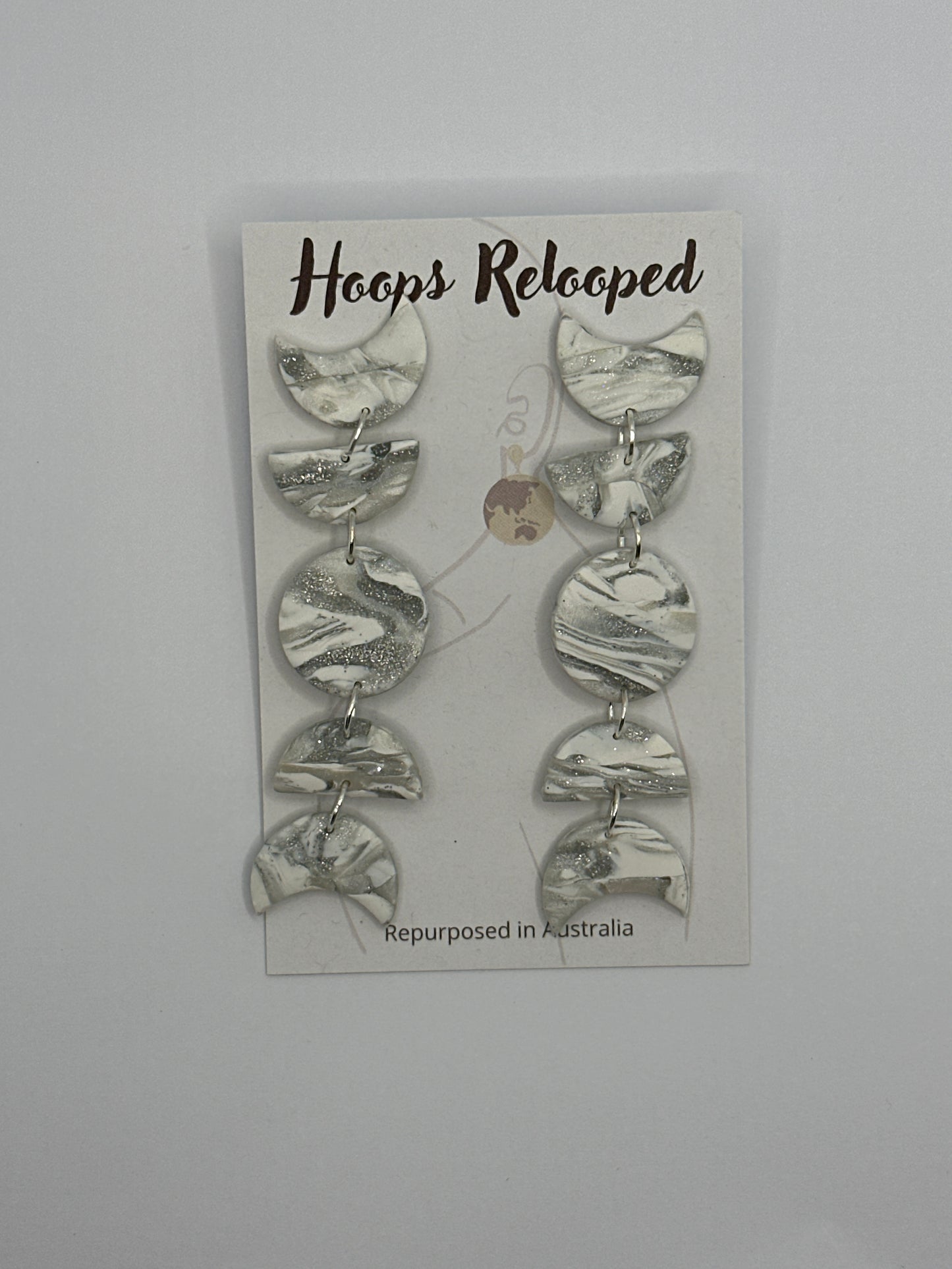 White and silver moon drops