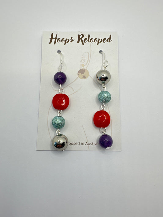 Purple, red, aqua and silver balls