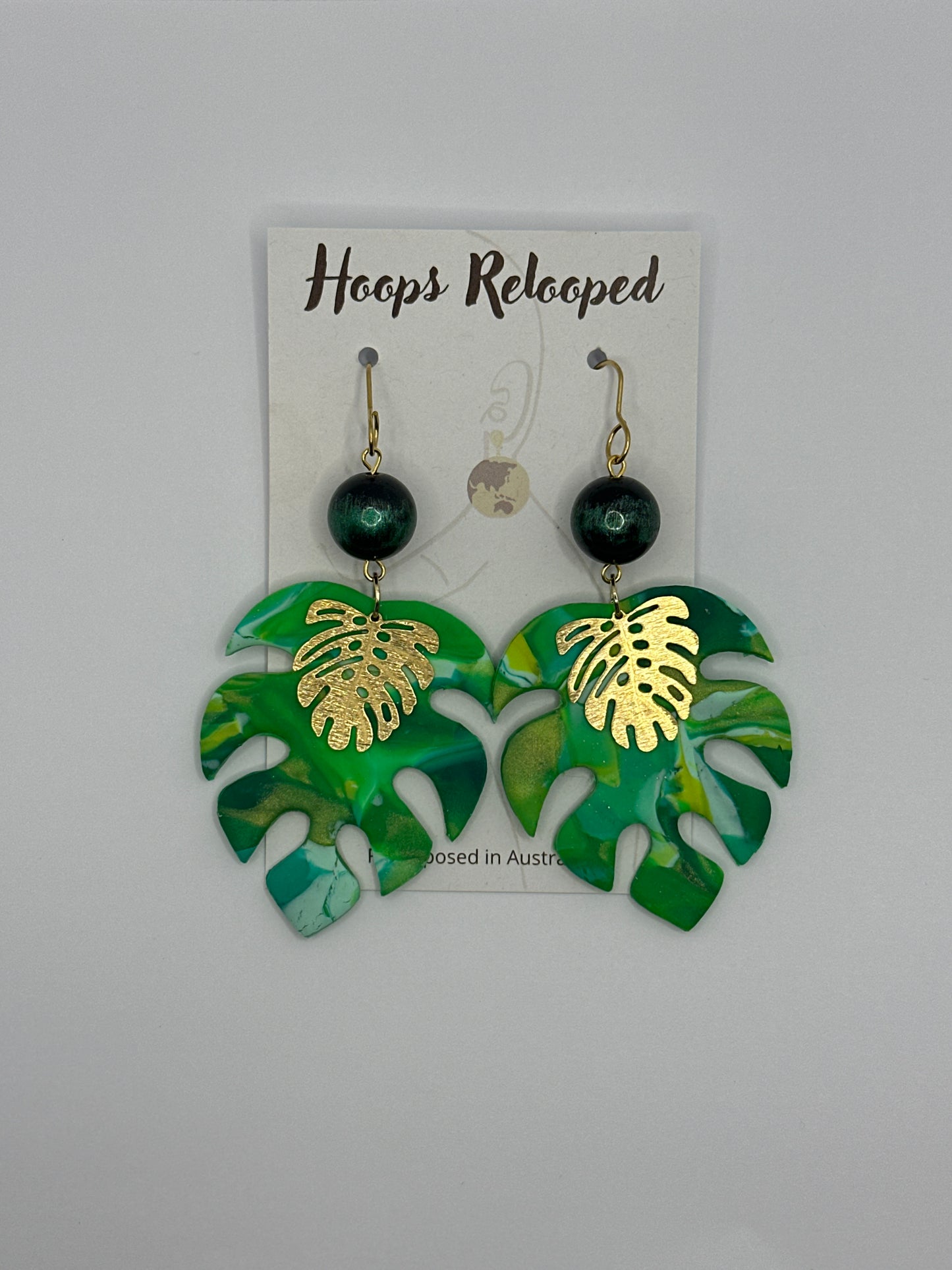 Large green monstera drops
