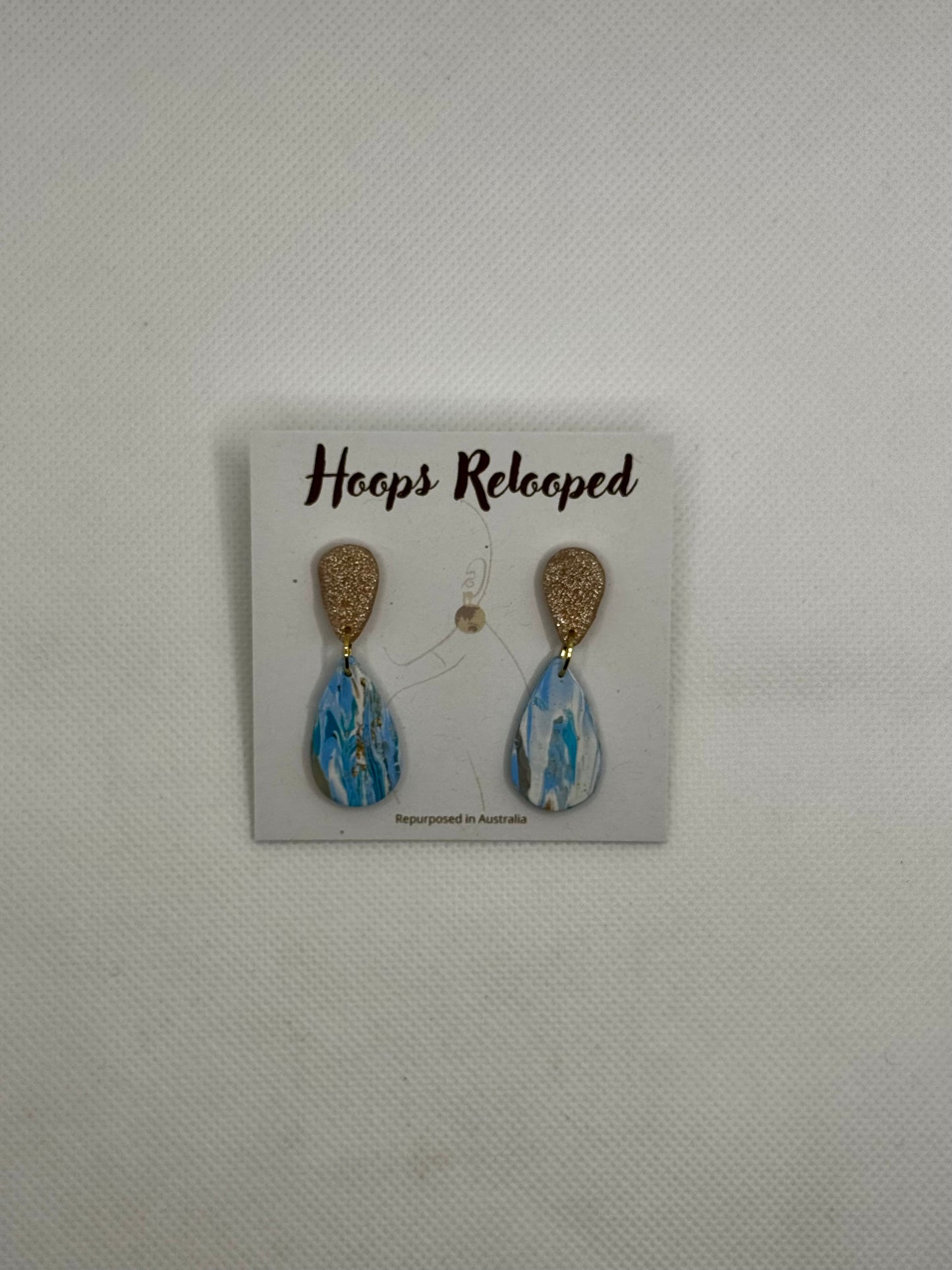 Silver and blue drops