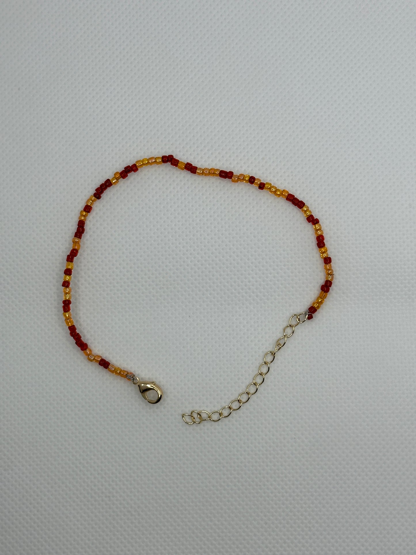 Red and orange bead bracelet