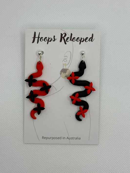 Reputation silver, red black asymmetric flower snakes