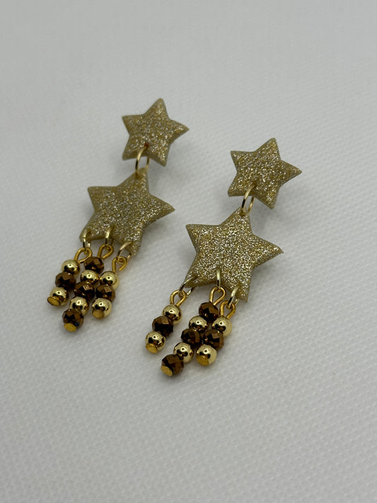 Fearless gold brown shooting stars (long dangles)