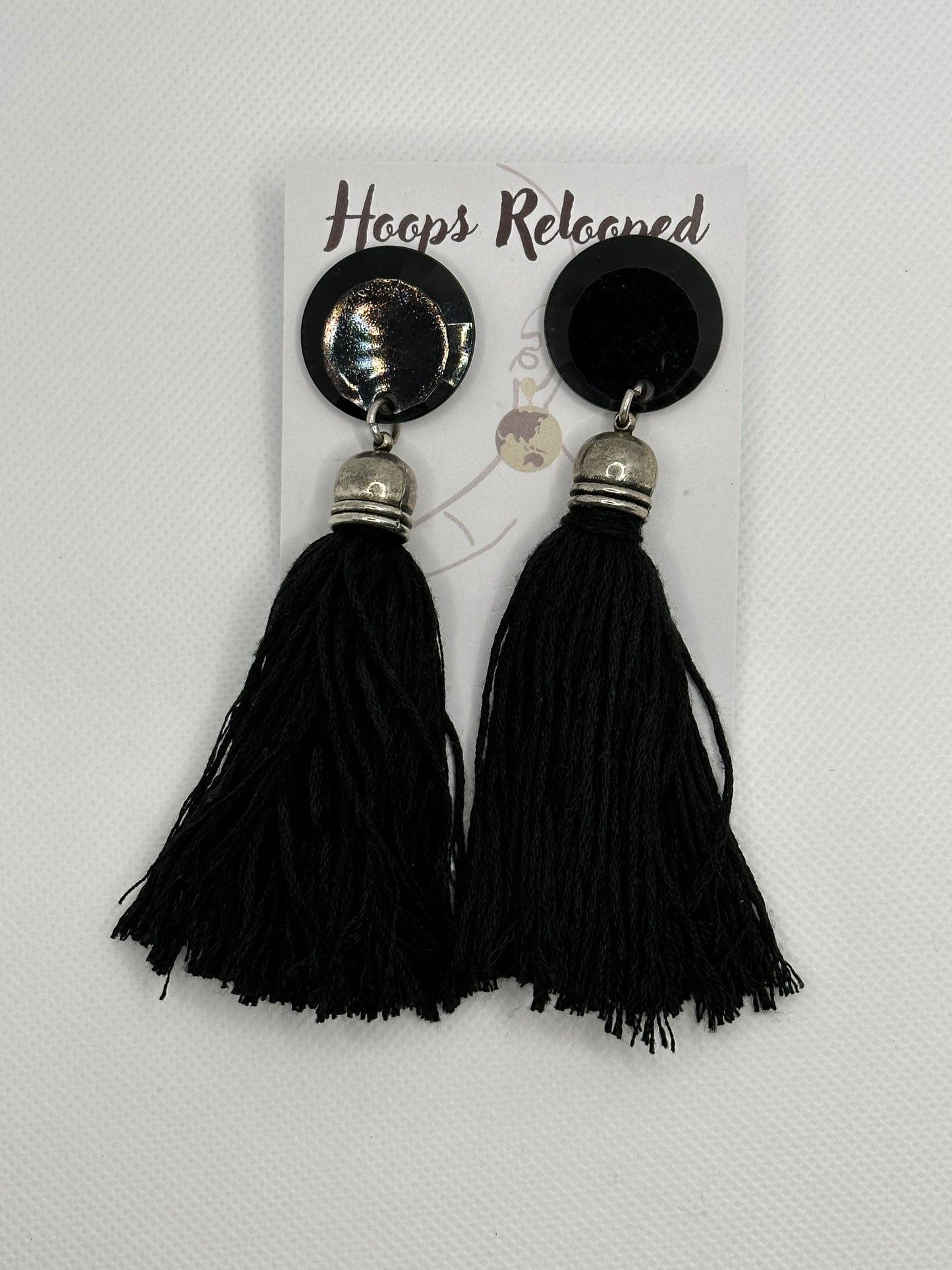 Black tassels